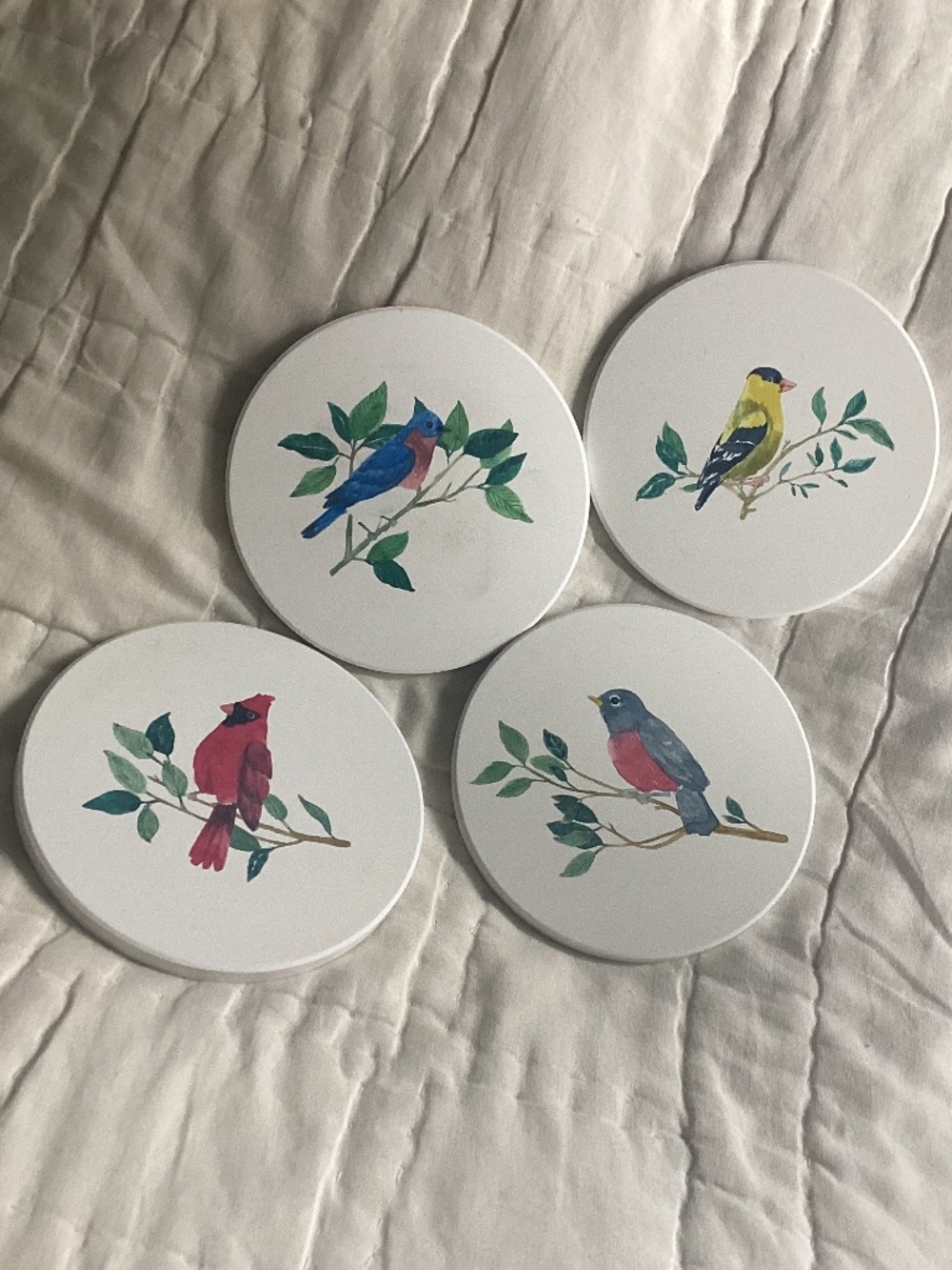 SET OF FOUR ABSORBENT CERAMIC BIRD THEMED COASTERS